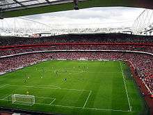 A near-capacity crowd watch Arsenal play Real Madrid on the second and final day of the pre-season tournament.