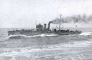 black and white photograph of a vessel underway