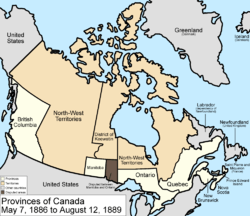 Map of the country of Canada on May 7, 1886, depicting the larger postage stamp sized province of Manitoba along with the provinces of Ontario northern border extended to the 51st parallel north, Prince Edward Island, Quebec (southern portion only), New Brunswick, British Columbia and Nova Scotia, in the colour white. The disputed area between Manitoba and Ontario is coloured black. Provinces are coloured white. The North-West Territories is separate from the slightly smaller District of Keewatin north of Manitoba. Territories are depicted in the colour pink; additionally now the northern arctic islands are a part of the NWT. The District of Keewatin now has a geographically shaped border to encompass the eastern borders of the newly formed provisional districts of the NWT. The area called Newfoundland, Labrador, and Alaska are depicted in bluish grey colour, and are not a part of Canada.