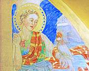 Three-quarters portrait of female with golden halo regarding cockatoo perched on her left arm