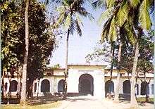 scroll atop shield outline