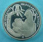 German 10 DM commemorative coin issued by the Federal Republic of Germany (1998): Hildegard of Bingen writing the book (Liber), 'Sci vias Domini', inspired by the hand of the Lord