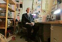 This photo by Lorie Kellogg depicts producer Joe Bevilacqua listening to a mix-down of his audio work.