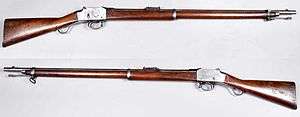Two breech-loading rifles of late 19th-century vintage
