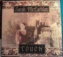 Woman near the fences and the stairs outdoors with leafless trees