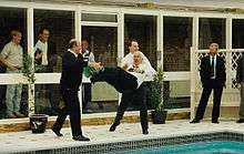 Peter Saville being thrown in to the SHL Management Centre pool
