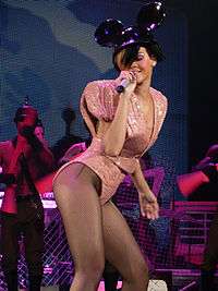 Rihanna performing on stage.
