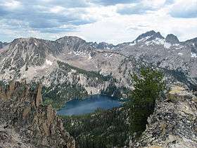 A photo of Snowyside Peak and Toxaway Lake from Sand Mountain Pass.