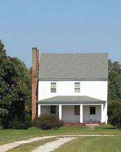 A two-storey white house